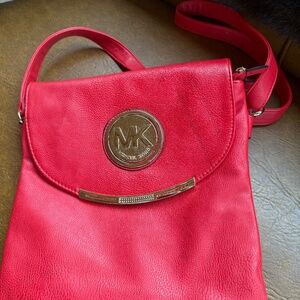 MICHAEL KORS RED PURSE NWOT. NEVER USED